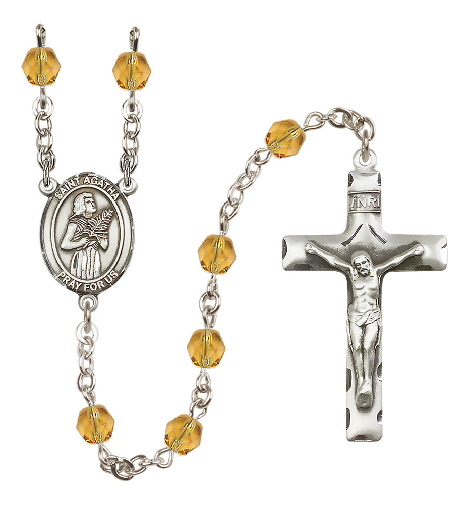 Bliss Silver Plated 6mm Fire Polished Saint Agatha Rosary in Topaz,