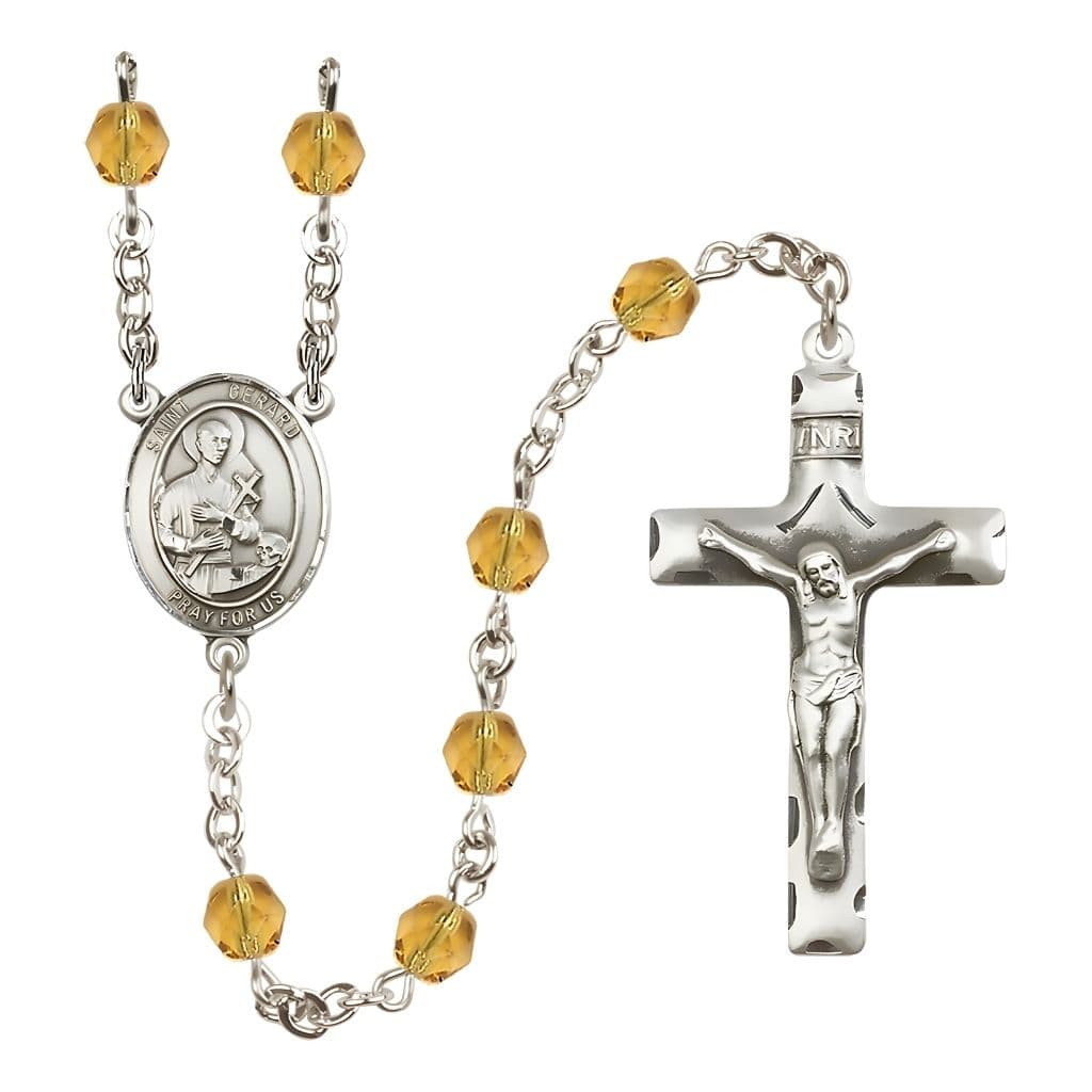 Bliss St. Gerard Majella Engravable Rosary with Pewter Crucifix and Centerpiece, Birthstone 6mm Fire Polished Topaz Beads for November