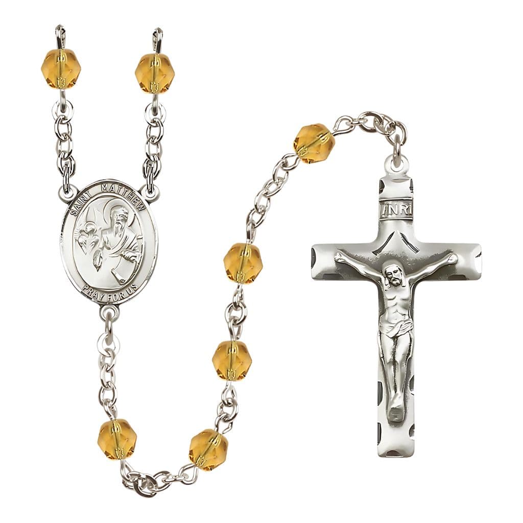 Bliss St. Matthew the Apostle Engraved Birthstone 6mm Fire Polished Rosary in Topaz