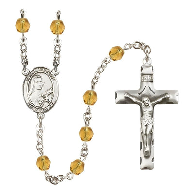 St. Therese of Lisieux Engraved Birthstone 6mm Topaz Fire Polished Rosary with Pewter Crucifix and Centerpiece, Bliss Manufacturing