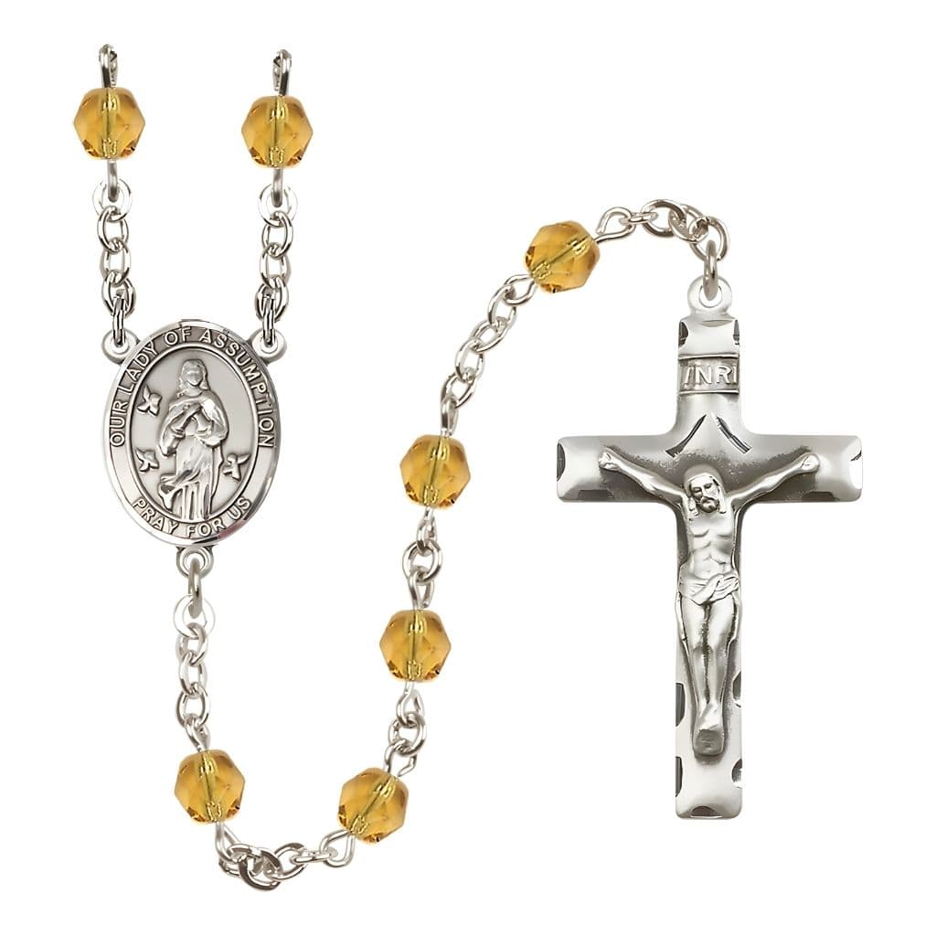 Our Lady of Assumption Engraved Birthstone 6mm Topaz Fire Polished Silver-plated Rosary with Pewter Centerpiece and Crucifix