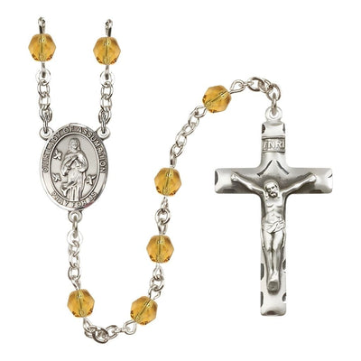 Our Lady of Assumption Engraved Birthstone 6mm Topaz Fire Polished Silver-plated Rosary with Pewter Centerpiece and Crucifix, Bliss Manufacturing