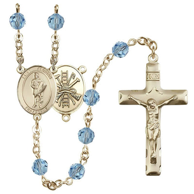 St. Florian centerpiece with firefighter gear on back Birthstone 14kt Gold Rosary with Aqua 6mm Austrian crystal beads with a traditional crucifix, Bliss Manufacturing