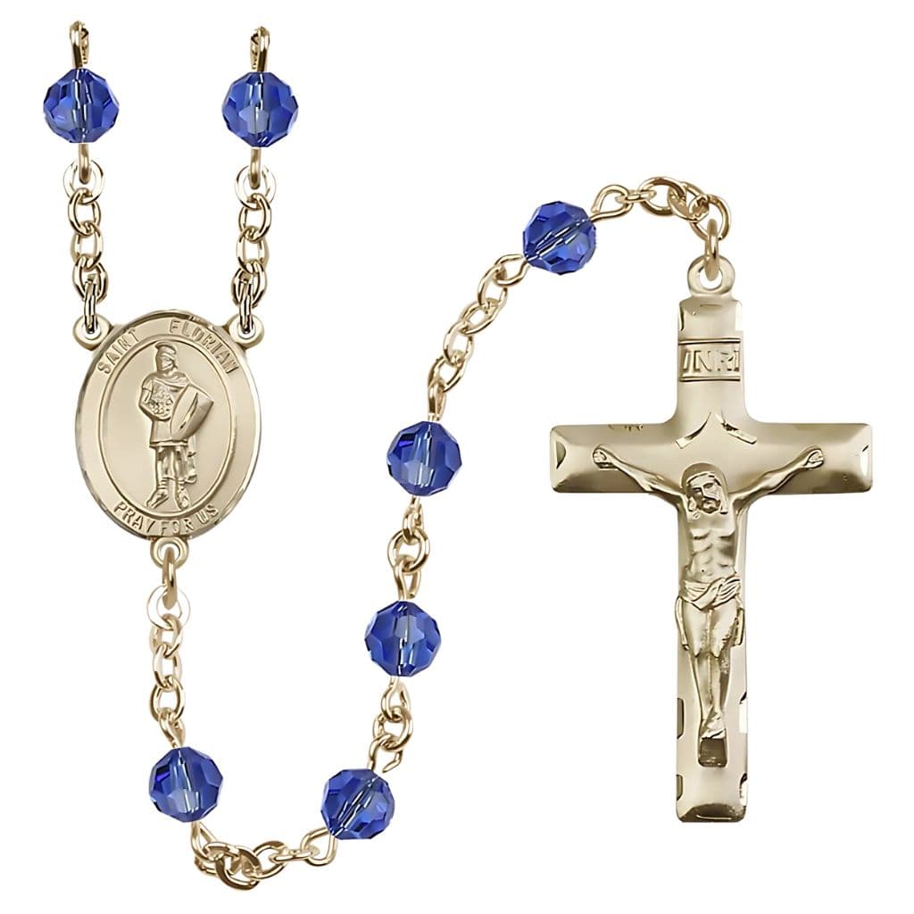 St. Florian Birthstone Rosary features 14kt gold construction with 6mm round Austrian crystal beads in sapphire.