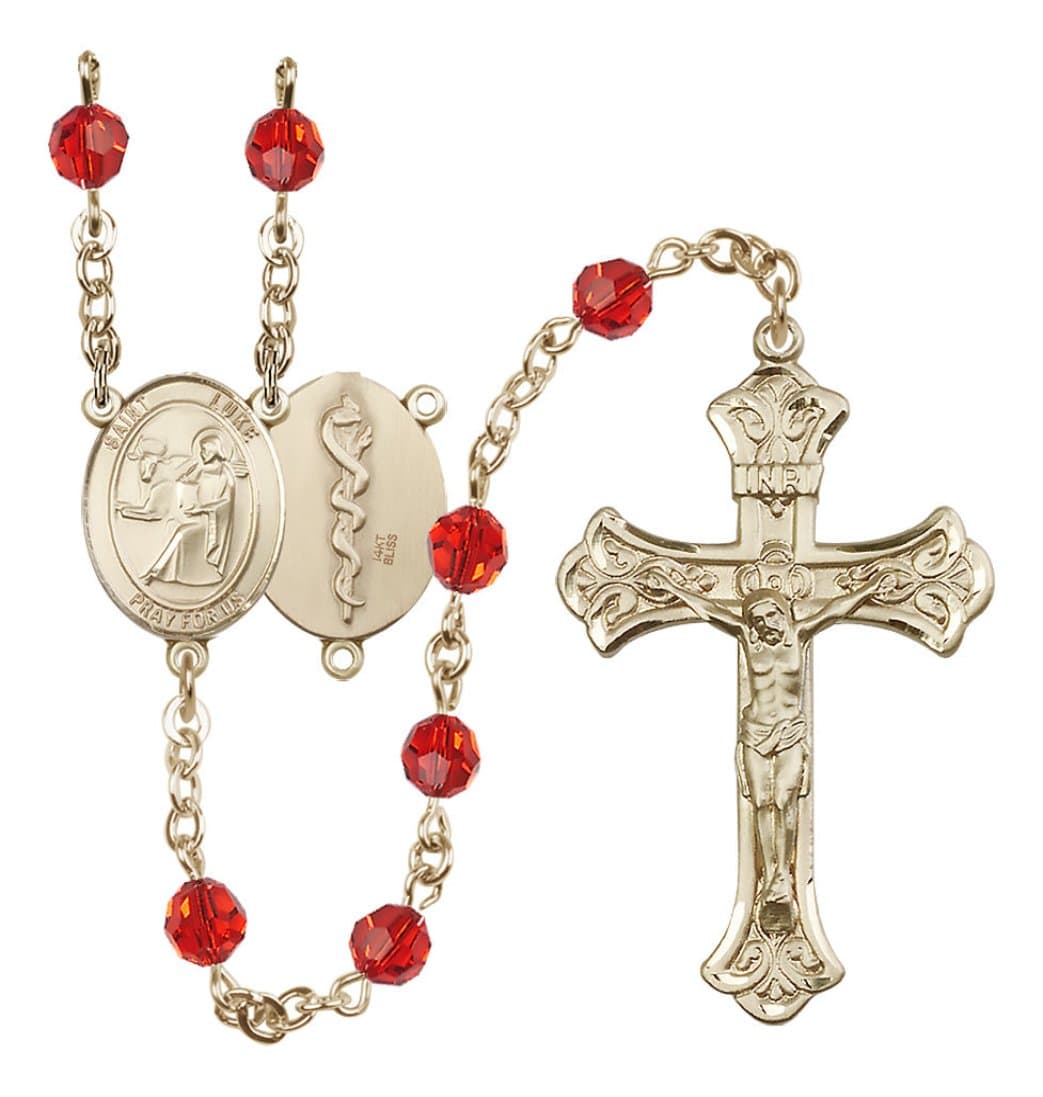 Bliss Doctor St Luke 14kt Gold Flared Tip Crucifix Crystal Rosary in July/Ruby,