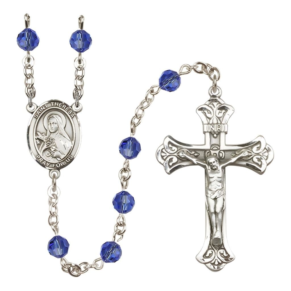 Bliss St. Theresa Sapphire 6mm Austrian Crystal September Birthstone Sterling Silver Rosary with Sterling Centerpiece and Scroll Design Crucifix