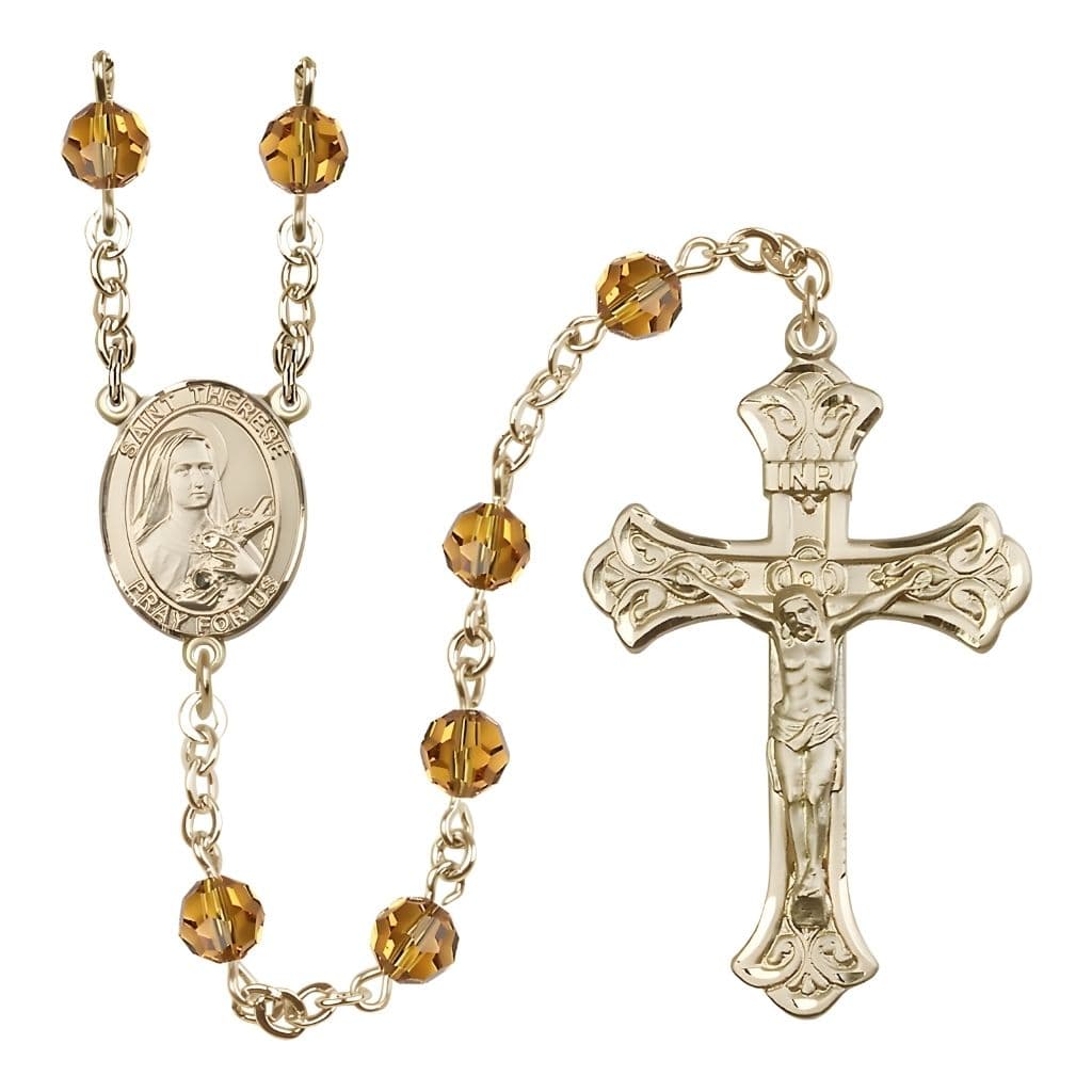 Bliss St. Therese of Lisieux 6mm Topaz Austrian Crystal Birthstone 14kt Gold Rosary with Scroll Design Crucifix