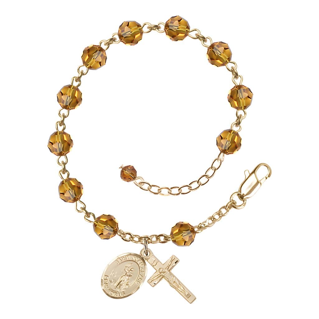 Bliss St. Joan of Arc Rosary Bracelet with 14kt Gold Crucifix and Charm, Birthstone 6mm Austrian Crystal Topaz Beads for November