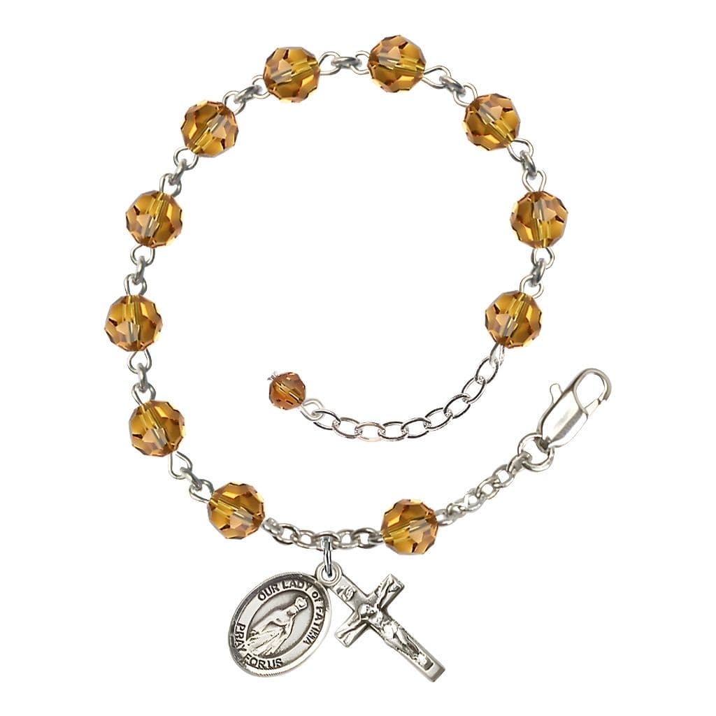 Bliss Our Lady of Fatima Rosary Bracelet with Sterling Silver Crucifix and Charm, Birthstone 6mm Austrian Crystal Topaz Beads for November