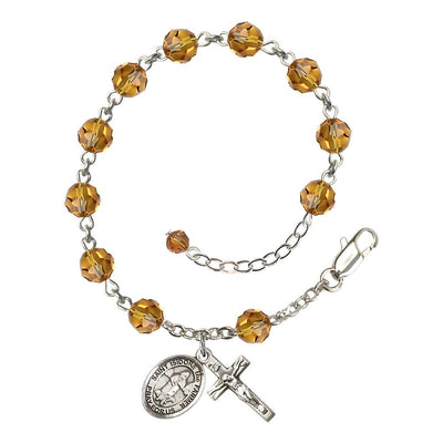 St. Isidore the Farmer Rosary Bracelet with Sterling Silver Crucifix and Charm, Birthstone 6mm Austrian Crystal Topaz Beads for November, Bliss Manufacturing