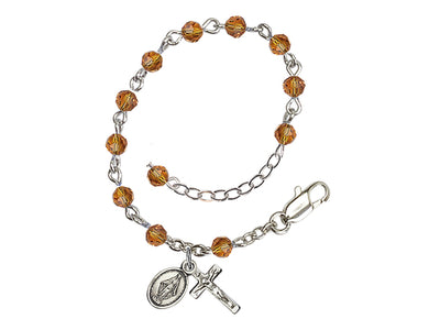 Baby 4mm Austrian Crystal Silver-plated Bracelet with Austrian Crystals with Light Sapphire Beads in Topaz, Bliss Manufacturing