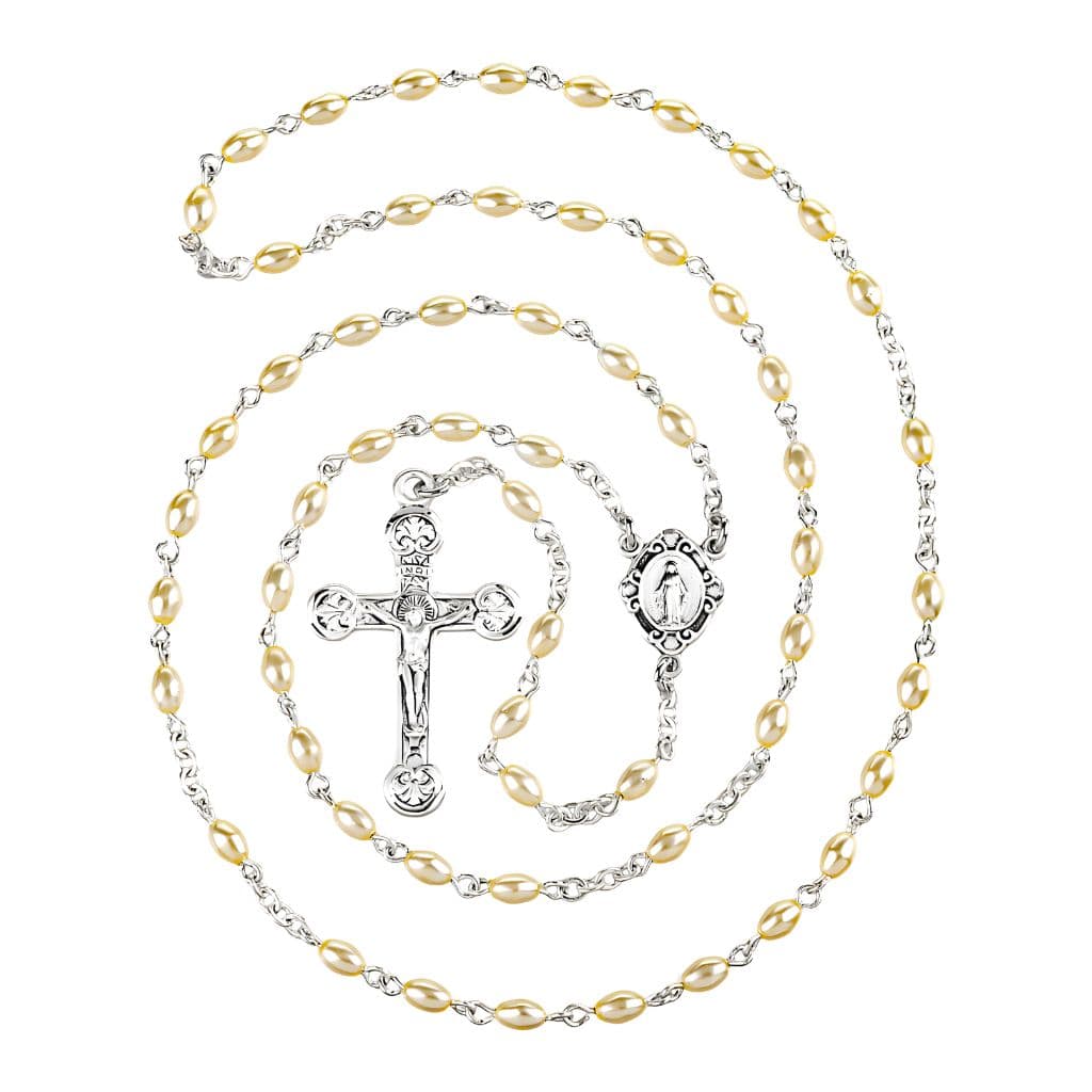 HMH Religious Children Miraculous Medal Sterling Silver Rosary featuring 3 x 5mm cream oval faux pearls. Sterling silver center and crucifix, 17-inches long.