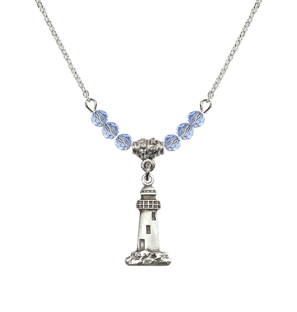 Bliss 4mm Light Sapphire Crystal Beads featuring a Sterling Silver Lighthouse Medal,