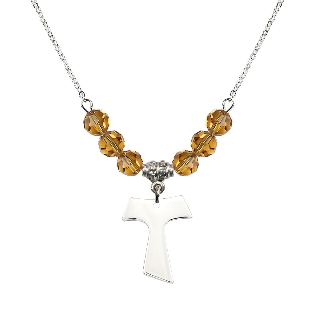 Bliss Franciscan Tau Cross Sterling Silver 6mm Crystal Bead Necklace in Topaz, Medal Measures 3/4 inch tall by 5/8 inch wide