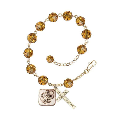 Adjustable St. Michael Army Gold Plated rosary bracelet with 8mm round Austrian Crystal beads in Topaz
