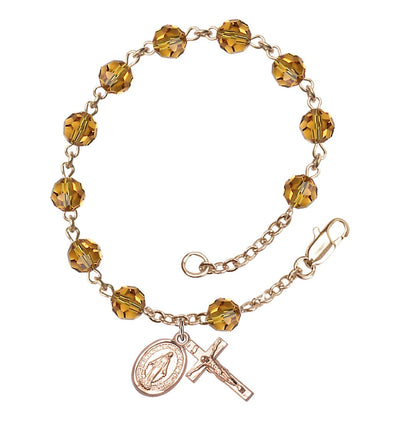 Miraculous 6mm Austrian Crystal 14kt Gold Rosary Bracelet in Topaz, Bliss Manufacturing