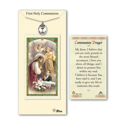 A boy's communion gift set featuring a pewter medal, both with religious imagery, and a laminated prayer card, Bliss Manufacturing