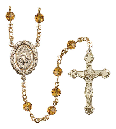 6mm Crystal Gold-Plated Rosary w/Gold-filled Center/Crucifix in Topaz, Bliss Manufacturing