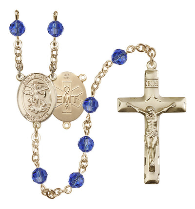EMT 14kt Gold 6mm Sapphire Austrian Crystal beads with a traditional crucifix rosary and St. Michael centerpiece with EMT symbol on back, Bliss Manufacturing
