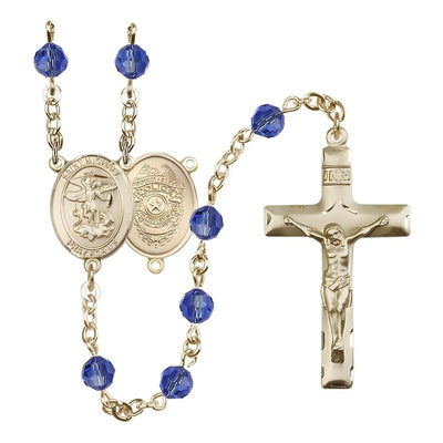 EMT 14kt Gold 6mm Sapphire Austrian Crystal beads with a traditional crucifix rosary and St. Michael centerpiece with Police Officer shieldl on back, Bliss Manufacturing