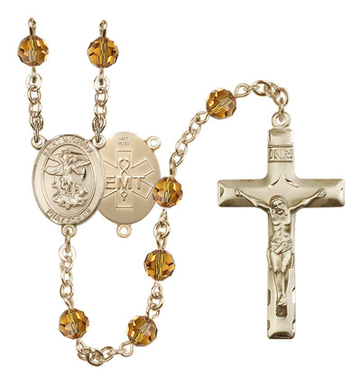 EMT 14kt Gold 6mm Topaz Austrian Crystal beads with a traditional crucifix rosary and St. Michael centerpiece with EMT symbol on back, Bliss Manufacturing