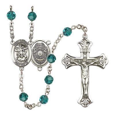 EMT Sterling Silver 6mm Zircon Austrian Crystal beads with a flared crucifix rosary and St. Michael centerpiece with Police Officer shieldl on back, Bliss Manufacturing