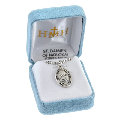 St. Damian of Molokai Oval sterling silver medal with the Sacred Hearts on his clothing in a gift box, HMH Religious
