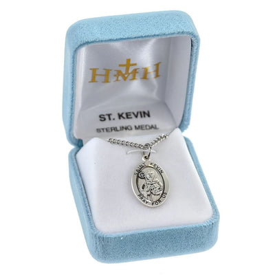 St. Kevin oval sterling silver medal with staff and bird’s nest design in gift box, HMH Religious
