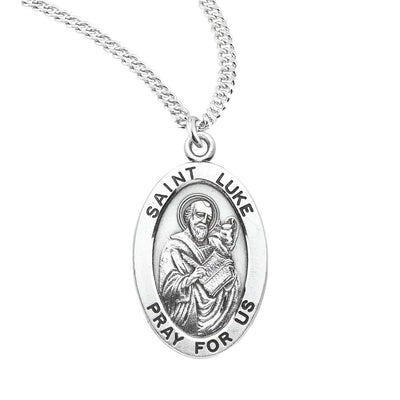 St. Luke sterling silver medal depiction with a book and bull, HMH Religious