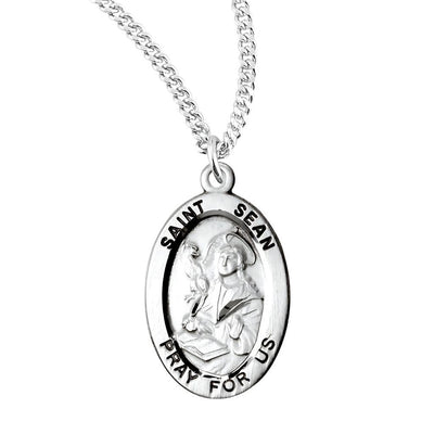 St. Sean oval sterling silver medal with an eagle and writing in a book, HMH Religious