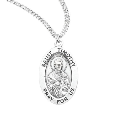 St. Timothy oval sterling silver medal holding a book, HMH Religious