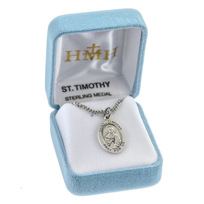 St. Timothy oval sterling silver medal holding a book in a gift box, HMH Religious