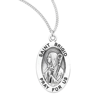 St. Brigid of Ireland oval sterling silver medal with a book and staff wearing nun's clothing, HMH Religious