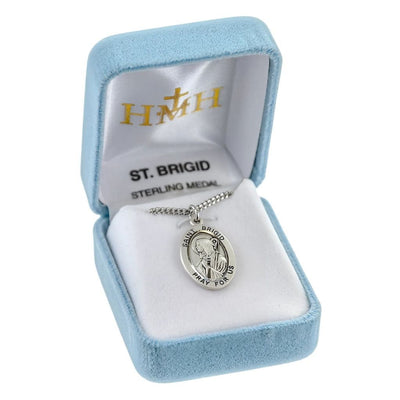 St. Brigid of Ireland oval sterling silver medal with a book and staff wearing nun's clothing in gift box, HMH Religious