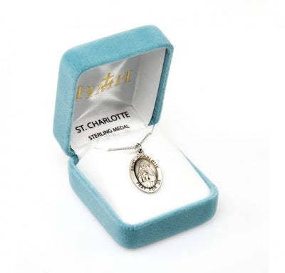 St. Charlotte sterling silver oval medal with a book in gift box, HMH Religious
