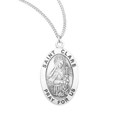 St. Clare sterling silver oval medal holding a monstrance, HMH Religious