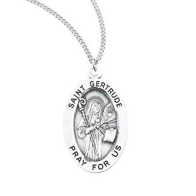 St. Gertrude sterling silver oval medal staff and a book, HMH Religious