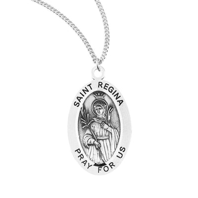 St Regina sterling silver oval medal with a palm and staff, HMH Religious