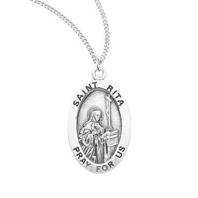 St. Rita sterling silver oval medal kneeling before an altar in nun's clothing, HMH Religious