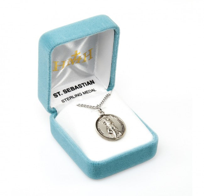 St Sebastian Round Sterling Silver Medal in box,